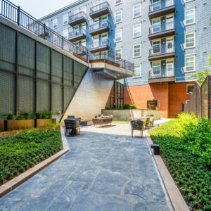 flagstone pathway through commercial apartment courtyard