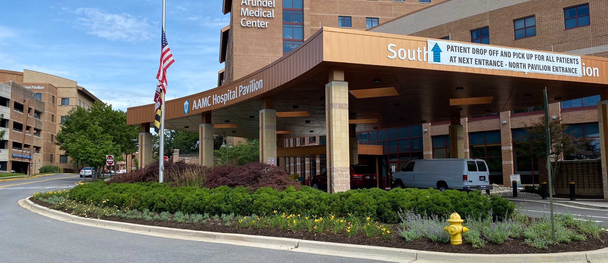 Entrance landscaping at a hospital Complete Landscaping Service commercial landscaping