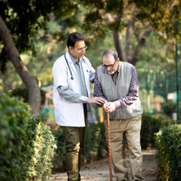 Doctor and patient walking in a green commercial landscape